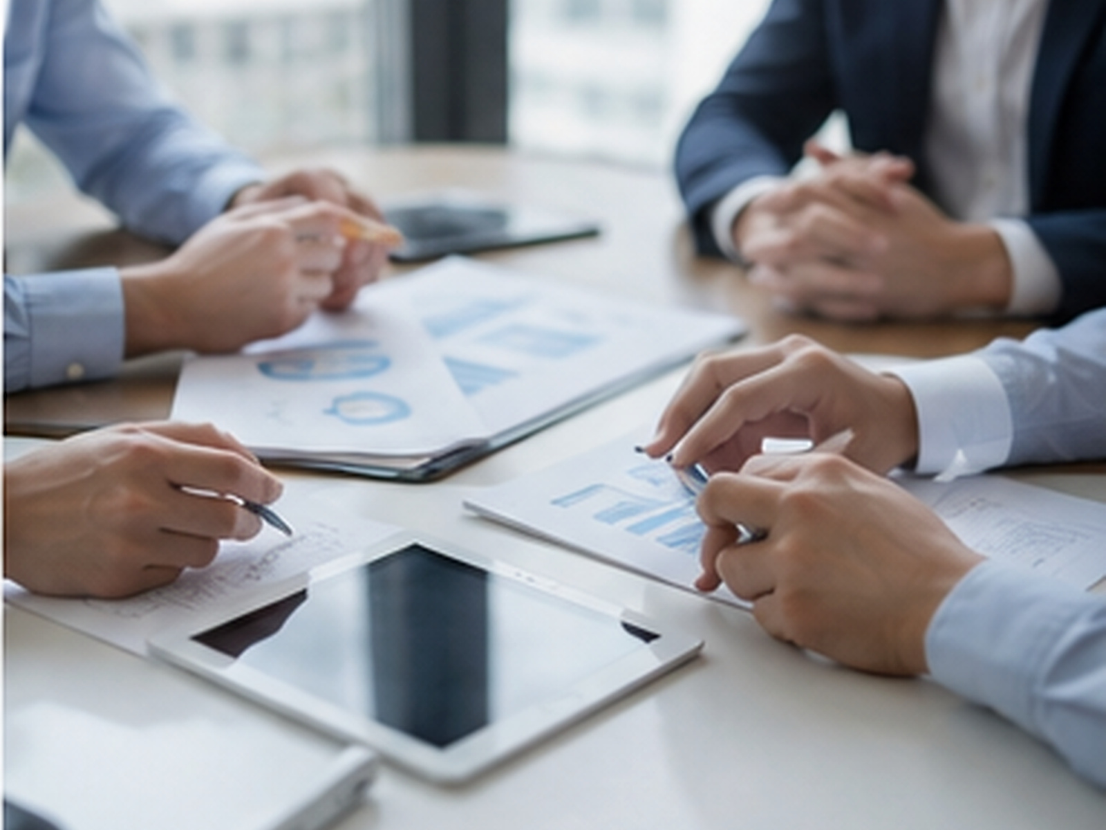 HR business clients reviewing background screening results together